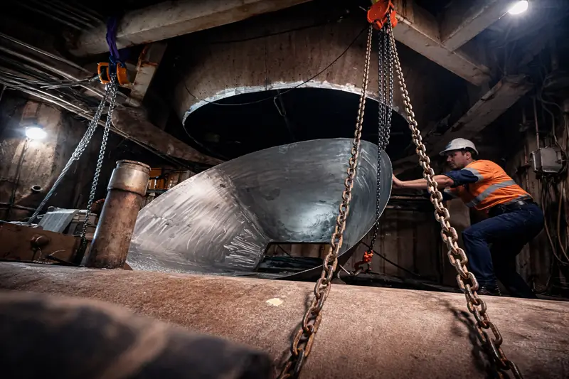 Hoisting a fabricated steel cone into position